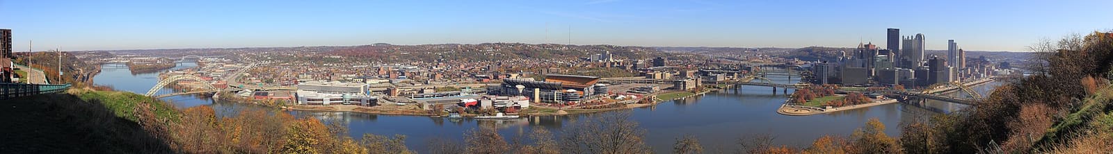 Pennsylvania: A panoramic view (ca. 190 degrees) of Pittsburgh from Mt. Washington on a clear autumn day. Created with Hugin from 8 ph