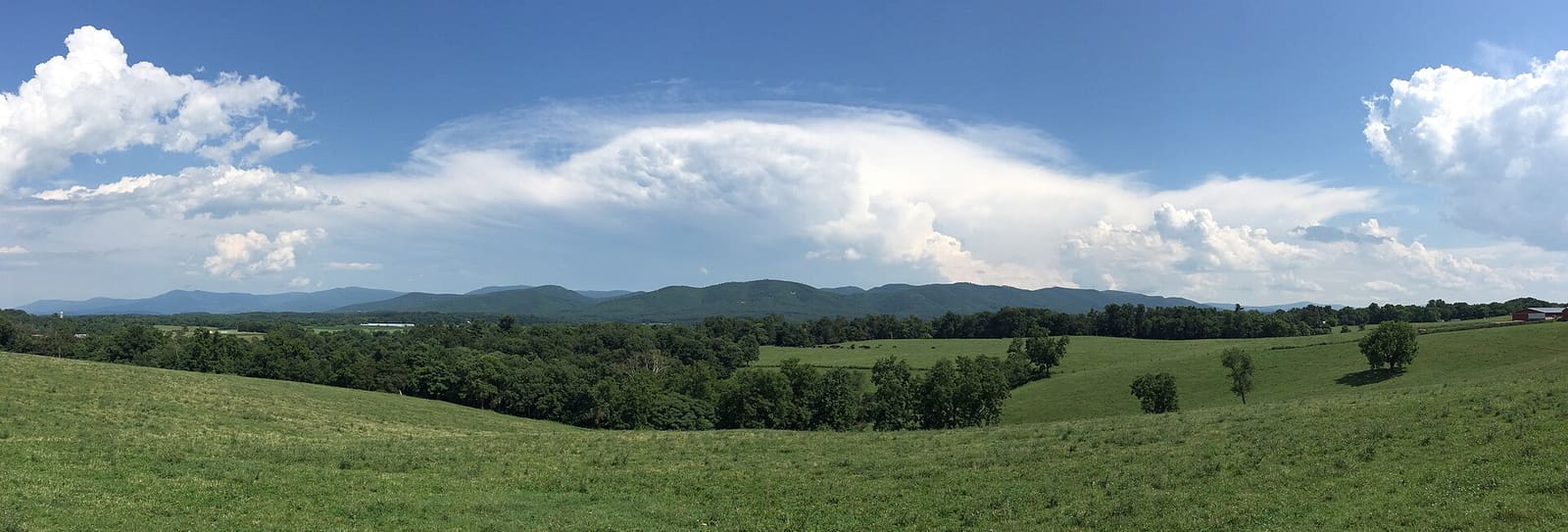 Virginia: View of a thunderstorm cumulonimbus east of the Blue Ridge Mountains in Shenandoah National Park from U.S. Route 340 sou